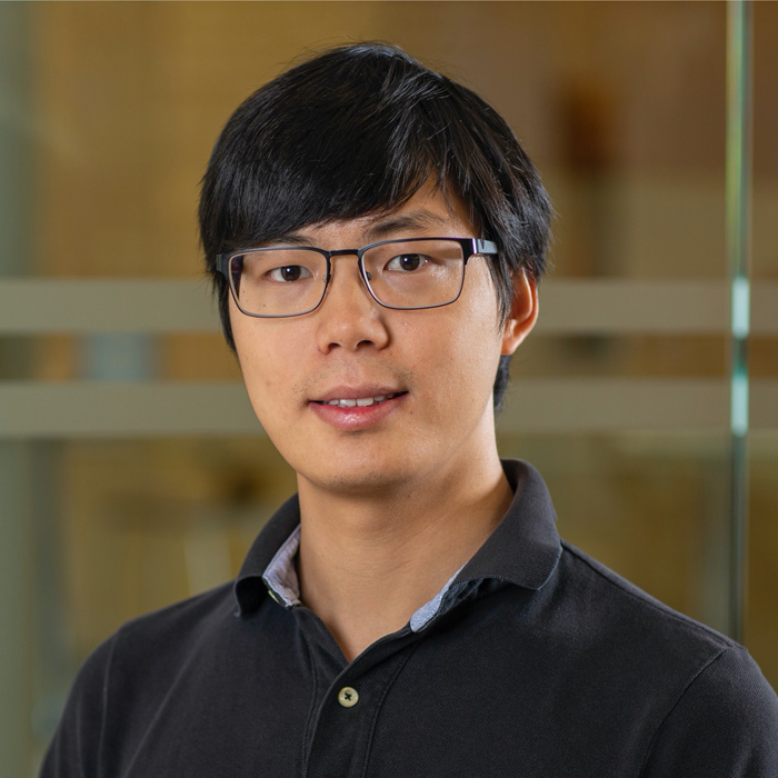 professor with two gator mascots